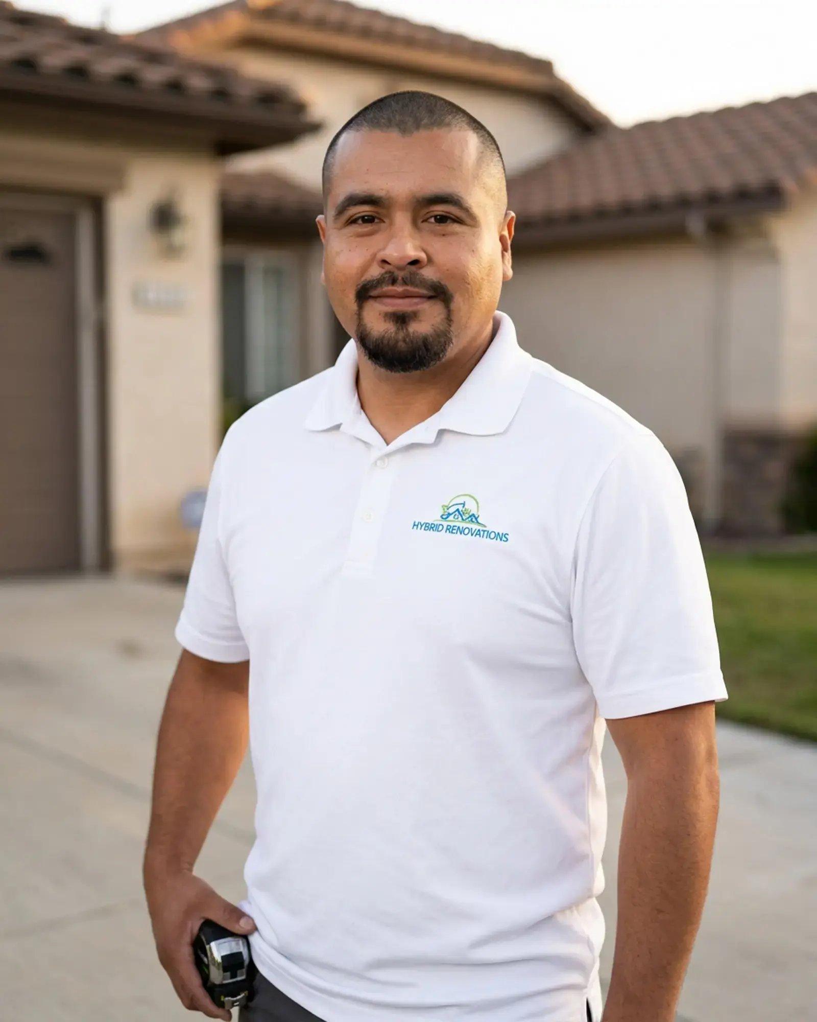 Adrian Gonzalez, home renovation consultant at Hybrid Renovations, outside a single-family home in LA and Orange County