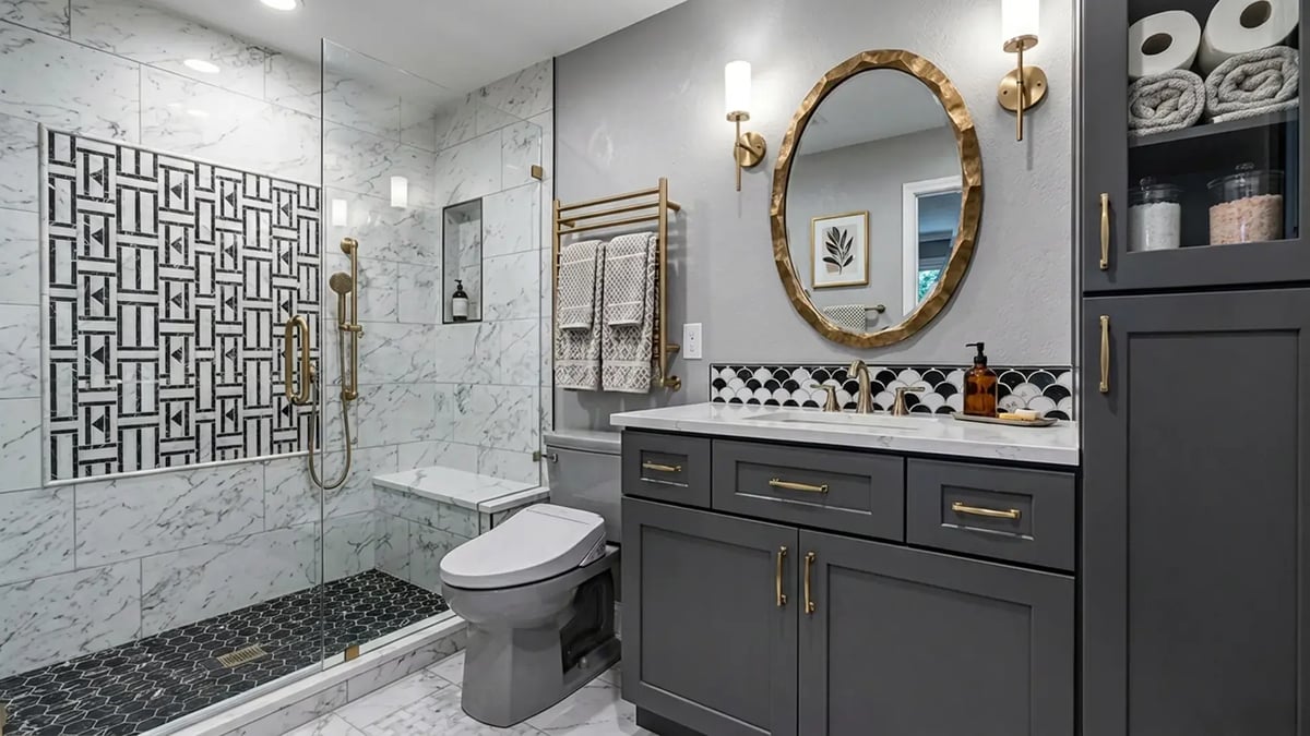 Marble tile shower with a geometric feature wall and charcoal vanity after a bathroom remodel — Hybrid Renovations