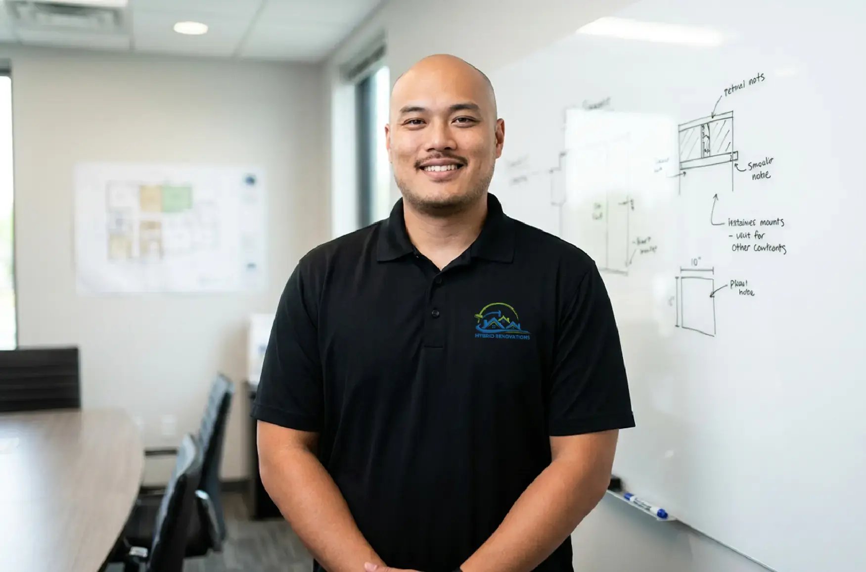 Henry Sheu Co-founder Hybrid Renovations office portrait