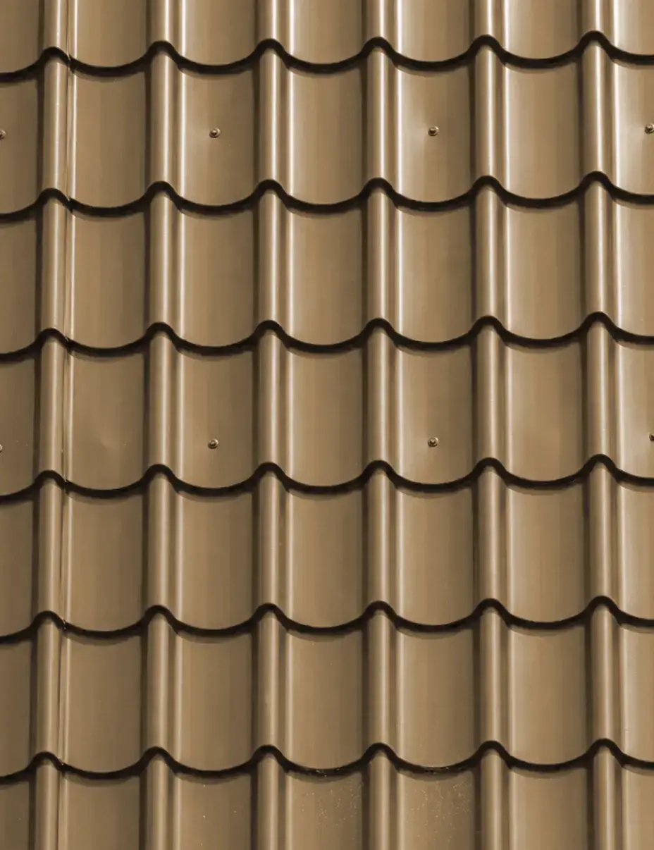 Sierra tan barrel-tile profile metal roofing color sample with a glossy S-curve finish — Hybrid Renovations